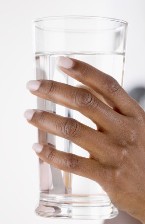 holding a glass of water
