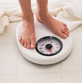 standing on a weight scale
